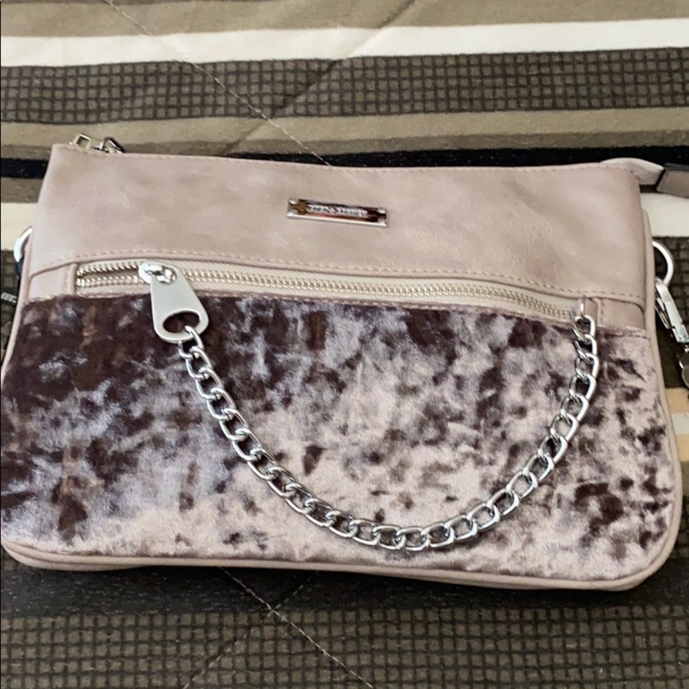 An adorable Coco+Carmen crushed pink velvet purse